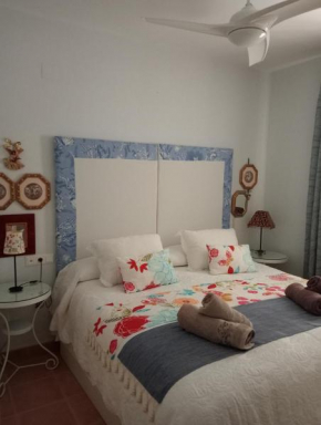 Casa coqueta con jardin